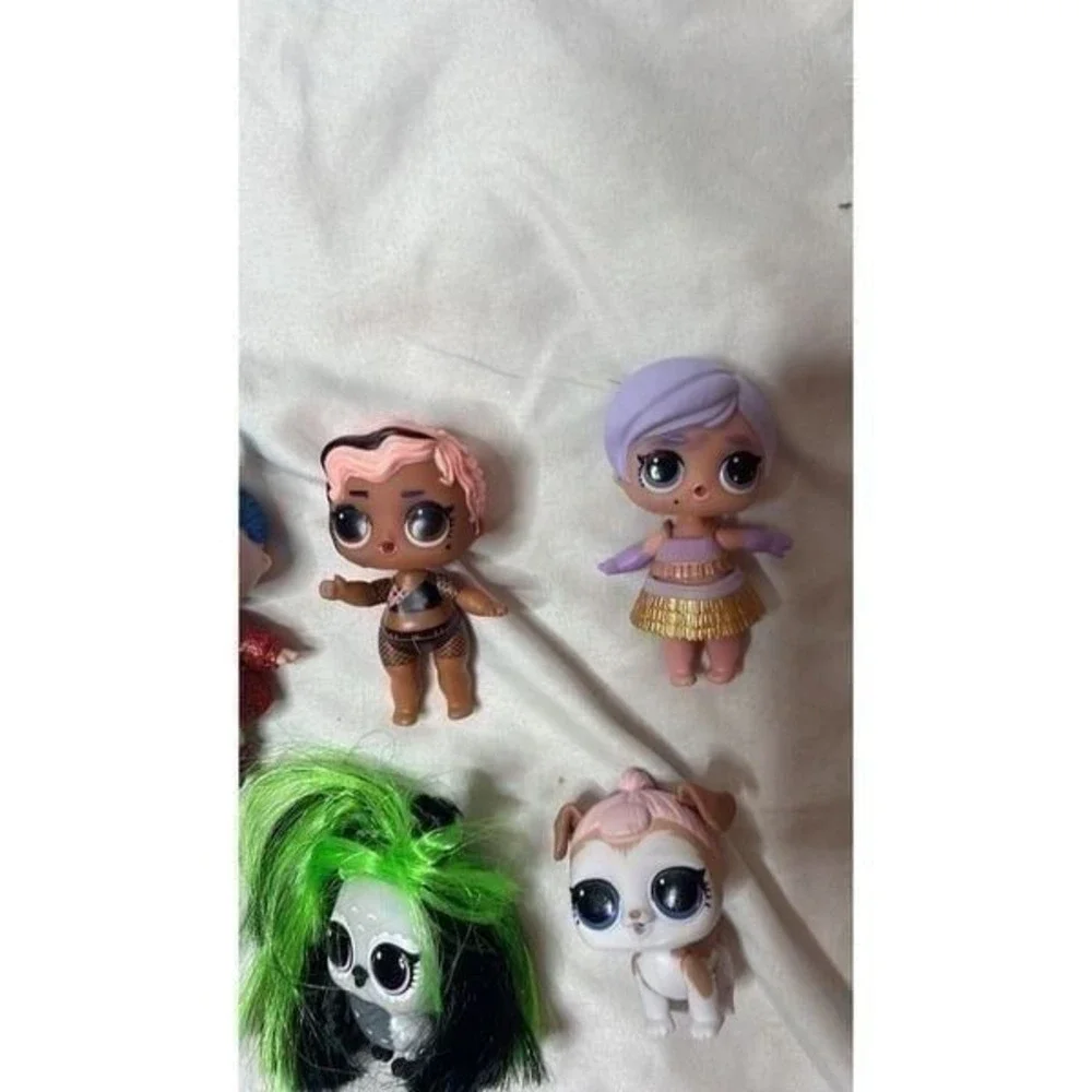 Set Of Nine LOL Surprise Dolls.